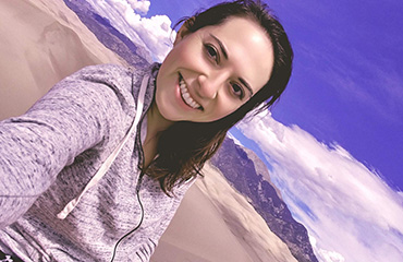 Rachael Winn hiking at the Sand Dunes in Colorado. 