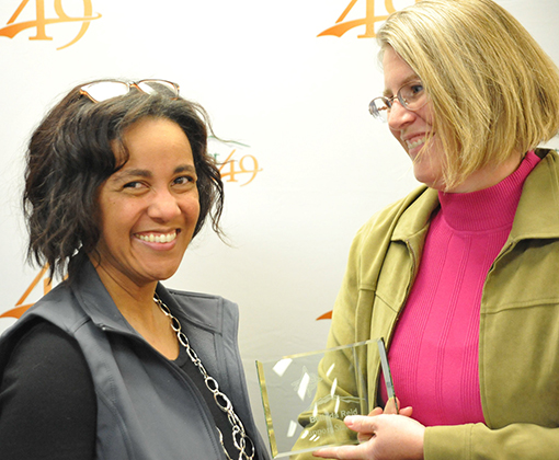  Belinda Reid from EIES accepts her Support Star award Nov. 20 from BOE president.