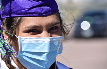  SSAE Grad smiles during graduation ceremony May 22