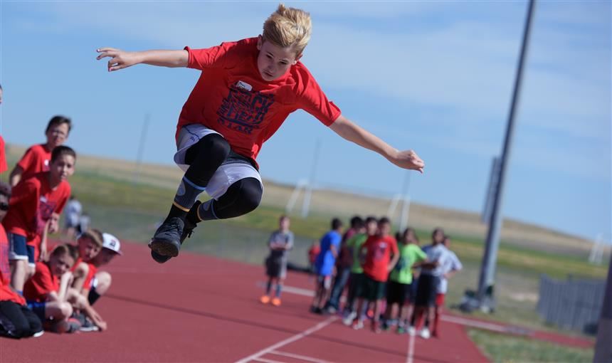  Ethan Falkenberg participates in the long jump event at the district track meet at FHS on May 17.
