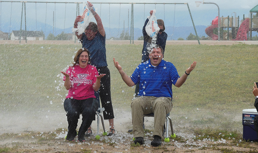  Kelly Warren and Mike Miller take the ALS ice bucket challenge with the help of Falcon Fire.